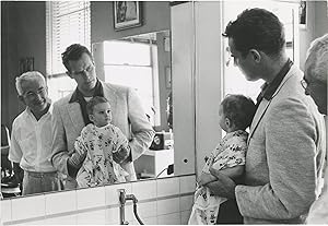 Original photograph of Charlton Heston and his son Fraser at a barbershop, circa 1956