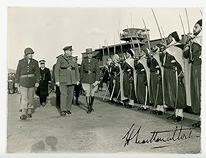 An original Second World War photograph of British General Henry Maitland Wilson inspecting Frenc...