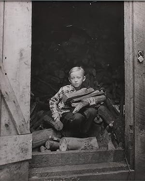 "DAVID WILLARD GATHERS WOOD FROM SHED, PHILIP'S DELIGHT SCHOOL" [Original Gelatin Silver Print]