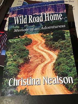 Signed. Wild Road Home: Memoir of an Adventuress