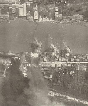 Bombing of Japanese dock installations at Surasdhani on the Kra Isthmus by Liberators after a fli...