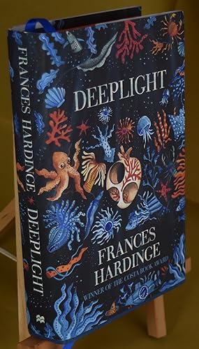Deeplight. First Printing. Signed by Author. Orange sprayed edges in limited print run.