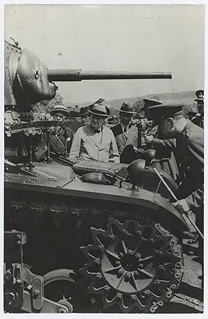 An original wartime Press photo of British Prime Minister Winston S. Churchill inspecting an Amer...