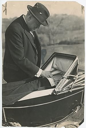 An original press photograph of Winston S. Churchill affectionately touching his grandson, Sir Ar...