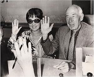 Original photograph of Henry Miller and Hoki Tokuda applying for a marriage license, 1963