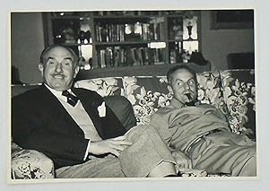 ORIGINAL CANDID PHOTOGRAPH OF MOVIE MOGULS JACK L. WARNER AND DARRYL F. ZANUCK. Circa 1955