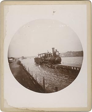 Archive of 46 original photographs of damages and repair work on the New Orleans and Northeastern...