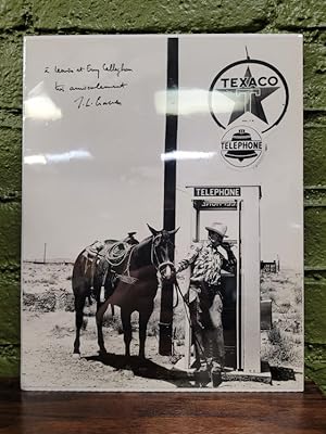 Photograph of Cowboy Using a Payphone
