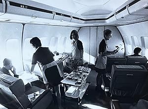 1970s Glossy Black and White Photo of Flight Attendants Serving a Meal to Lufthansa 747 First Cla...