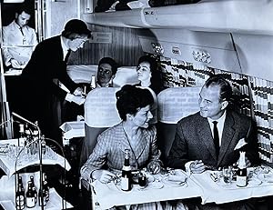 1970s Glossy Black and White Photo of Lufthansa First Class Passengers Enjoying an In-Flight Meal
