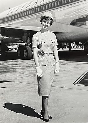 A 1960s Glossy Black and White Portrait of a Lufthansa Flight Attendant