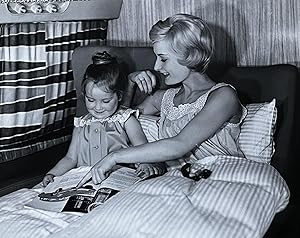 1960s Glossy Black and White Photo of a Mother and Child on a Lufthansa Flight