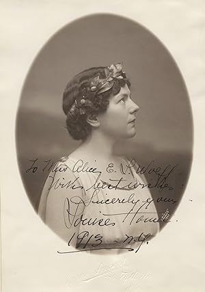Bust-length oval photograph of the American contralto in profile with a garland in her hair with ...