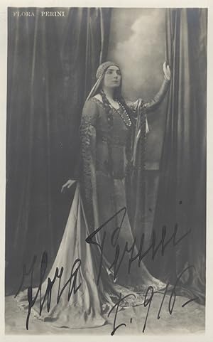 Full-length postcard photograph of the Italian mezzo-soprano in role portrait with autograph sign...