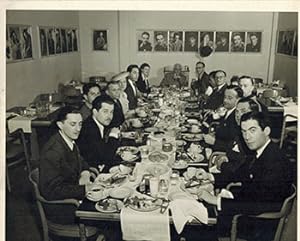 Photograph of 17 Warner Brothers' honchos in the Executive Dining Room in the 1940s.