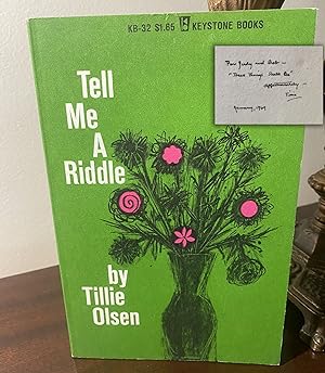 TELL ME A RIDDLE. Signed