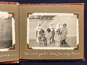 [AFRICAN COLONIALISM FOR CHILDREN]. Photo Album of Belgian Children (novitiates?) posed as missio...