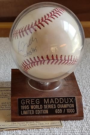 Official Rawlings 1995 World Series Baseball Signed by Greg Maddux [Includes COA and stand]