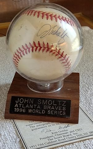 Official Rawlings 1996 World Series Baseball Signed by John Smoltz [Includes COA and stand]