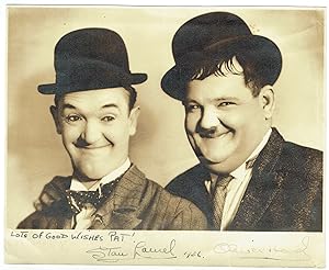 Vintage matte-finish 9.5 x 7.75 photo of Laurel and Hardy side-by-side in their bowler hats, sign...