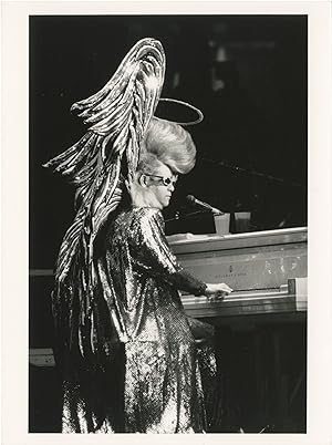 Collection of thirteen original photographs of Elton John, circa 1970s
