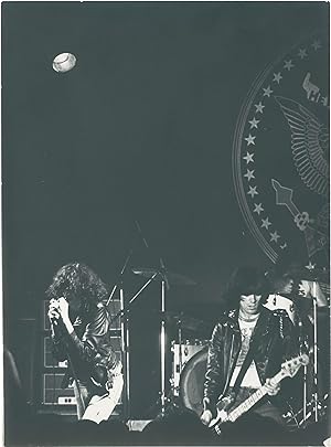 Three original photographs of the Ramones in concert in Paris, 1977