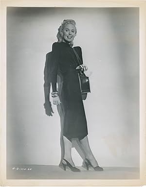 Framed (Three original photographs of Janis Carter from the 1947 film noir)