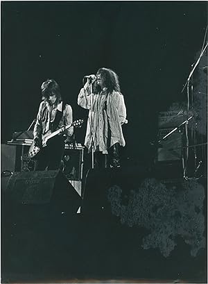 Two original photographs of Patti Smith onstage in Paris, 1978