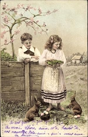 Ansichtskarte / Postkarte Ostern, Kinder füttern Hasen, Körbe mit Ostereiern