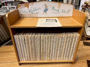 Peter Rabbit's Book Shelf. Complete set of 23 titles of Beatrix Potter in a wooden bookcase