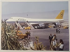 Circa 1980s Glossy Color Press Photo of a Condor Air Boeing 747 Jumbo Jet on a Runway