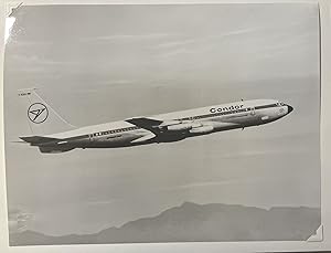 Circa 1980s Glossy Black and White Press Photo of a Condor Air DAB0V Jet in Flight