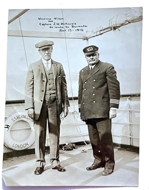 Woodrow Wilson and Captain J.W. McKenzie en route to Bermuda Nov. 17 - 1912. [caption in black at...
