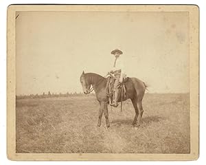 [Cowboy on Range with Native American Tepees]