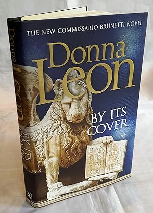 By Its Cover. SIGNED BY AUTHOR.