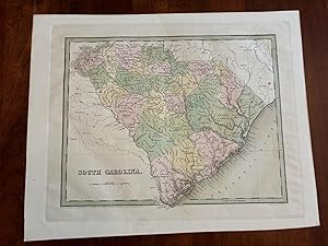 Colored Map of South Carolina Shows County Seats and Railroad Line from Augusta to Charleston.