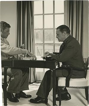 Original press photograph of W. Somerset Maugham and Glenway Wescott playing cards, 1942