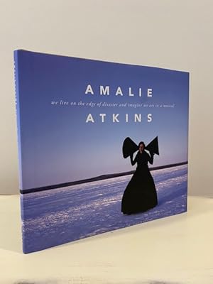AMALIE ATKINS: WE LIVE ON THE EDGE OF DISASTER AND IMAGINE WE ARE IN A MUSICAL **FIRST EDITION**