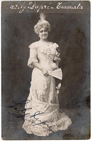 DUPRE, Lily signed photo postcard, shown in "La Traviata"
