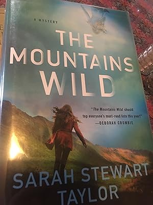 Signed. The Mountains Wild: A Mystery (Maggie D'arcy Mysteries, 1)
