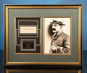 Portrait photograph of Rudyard Kipling as a young man. With clipped signature