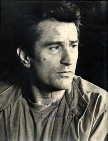 Autographed black and white publicity photograph of Analyze This star Robert De Niro.