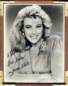 Autographed black and white publicity photograph of "Wheel of Fortune" mistress Vanna White.