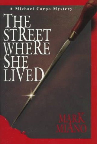 THE STREET WHERE SHE LIVED: A Michael Carpo Mystery