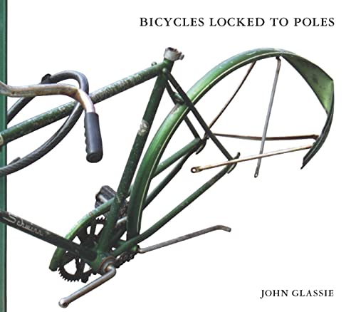 Bicycles Locked To Poles