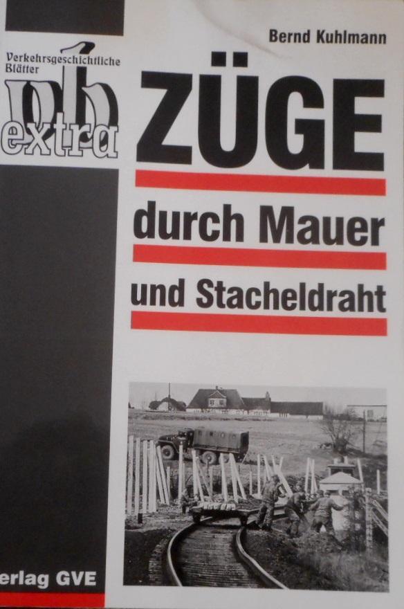 Züge durch Mauer und Stacheldraht