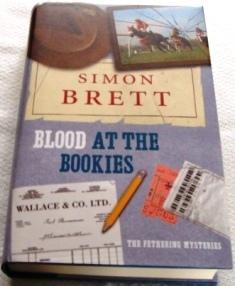 BLOOD AT THE BOOKIES: A Fethering Mystery