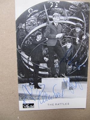 Signierte Autogrammkarte. Von allen vier Bandmitgliedern unterschrieben.