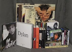 Collection of Bob Dylan books, CDs, VHS tapes, and DVDs featuring 56 books (3 of which are duplic...