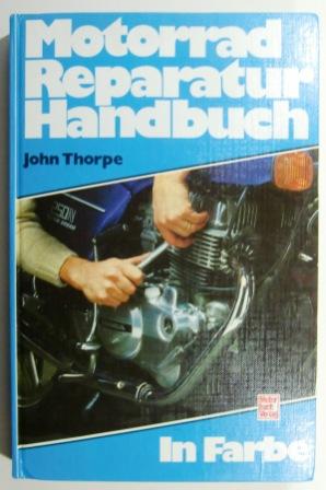 Motorrad-Reparatur-Handbuch in Farbe.